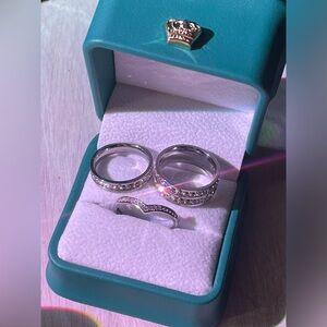 1 Moissanite .925 stamped Sterling silver adjustable V ring band.